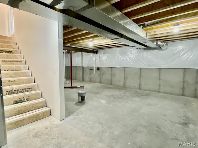 713 Conner Cir, Fairview Heights, IL 62208 - unfinished basement featuring stairway