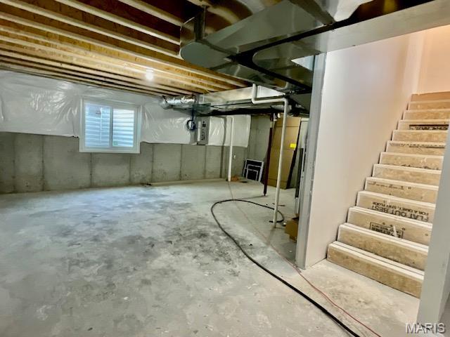 713 Conner Cir, Fairview Heights, IL 62208 - basement with stairs and electric panel
