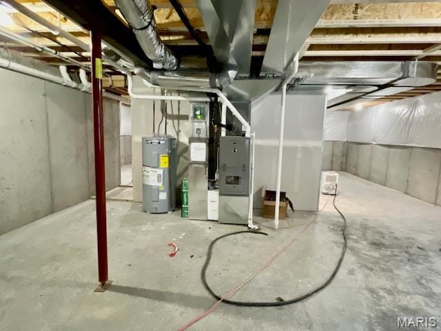 713 Conner Cir, Fairview Heights, IL 62208 - unfinished basement featuring electric water heater