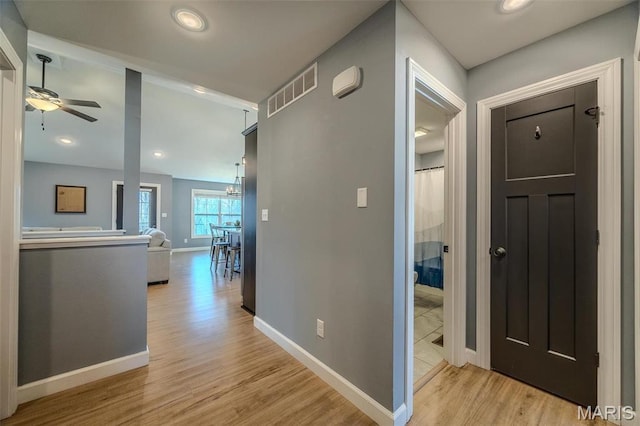 117 Alice Dr, Waynesville, MO 65583 - hallway featuring light wood-style flooring, baseboards, and recessed lighting
