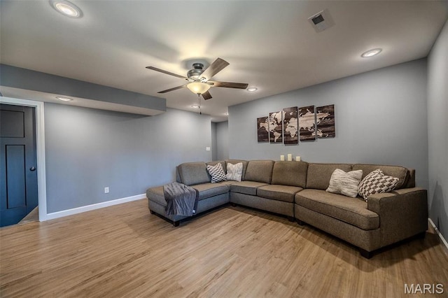 117 Alice Dr, Waynesville, MO 65583 - living room with light wood finished floors, ceiling fan, baseboards, and recessed lighting