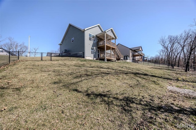 117 Alice Dr, Waynesville, MO 65583 - back of property featuring stairway and a deck