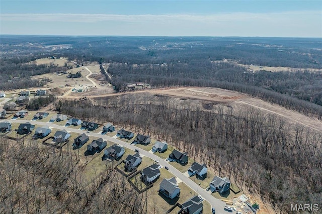 117 Alice Dr, Waynesville, MO 65583 - aerial view of property and surrounding area featuring a heavily wooded area