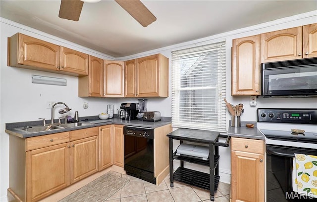 125 Lithia Ave, Saint Louis, MO 63119 - kitchen featuring black appliances, a sink, ceiling fan, light tile patterned flooring, and dark countertops
