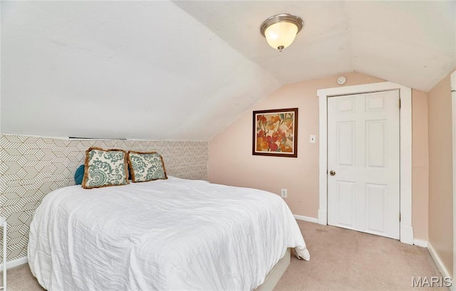 125 Lithia Ave, Saint Louis, MO 63119 - bedroom with light colored carpet, lofted ceiling, and baseboards