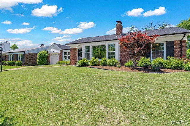 927 Gay Ave, Saint Louis, MO 63130 - single story home featuring brick siding, a garage, a front lawn, and a chimney