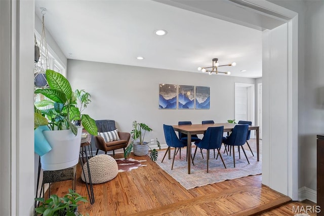 927 Gay Ave, Saint Louis, MO 63130 - dining space with a chandelier, baseboards, wood finished floors, and recessed lighting