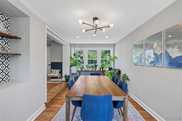 927 Gay Ave, Saint Louis, MO 63130 - dining area featuring a chandelier, wood finished floors, baseboards, and recessed lighting