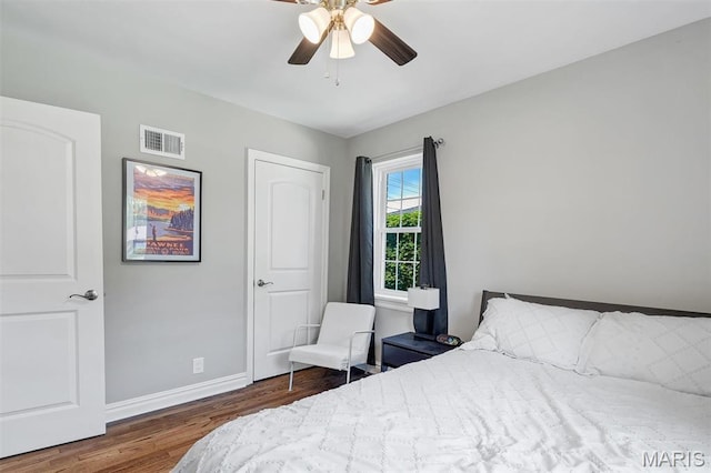 927 Gay Ave, Saint Louis, MO 63130 - bedroom featuring wood finished floors, baseboards, and a ceiling fan