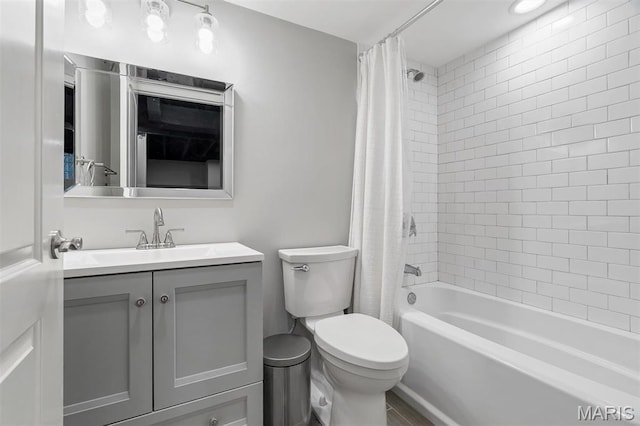 927 Gay Ave, Saint Louis, MO 63130 - full bath featuring vanity, toilet, and shower / tub combo with curtain