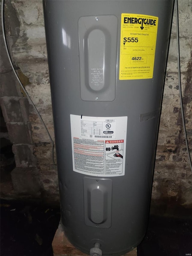 utility room with electric water heater