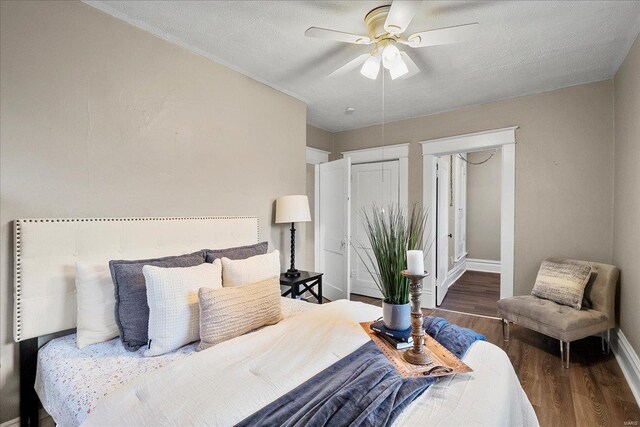 2152 State St, Granite City, IL 62040 - bedroom featuring wood finished floors, baseboards, and ceiling fan