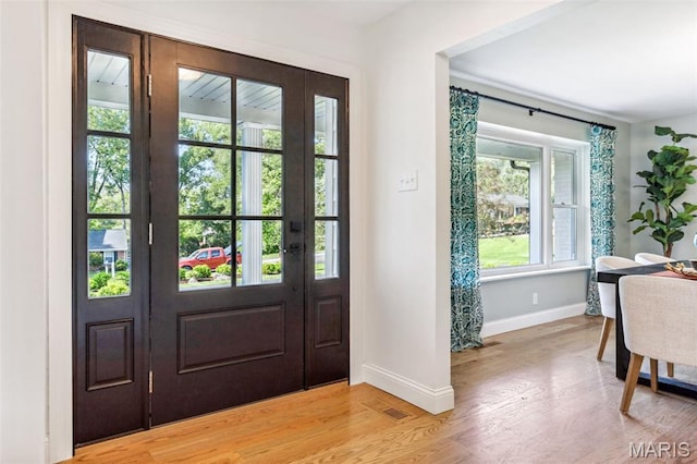 502 Briar Ridge Ln, Saint Louis, MO 63131 - entrance foyer with baseboards and light wood-style flooring