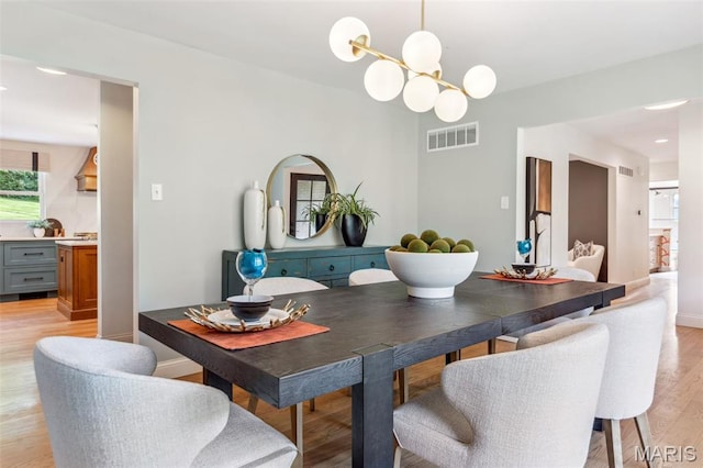 502 Briar Ridge Ln, Saint Louis, MO 63131 - dining room with a chandelier, light wood-type flooring, baseboards, and recessed lighting