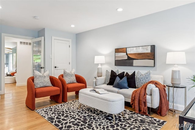 502 Briar Ridge Ln, Saint Louis, MO 63131 - living area with baseboards, light wood-style floors, and recessed lighting