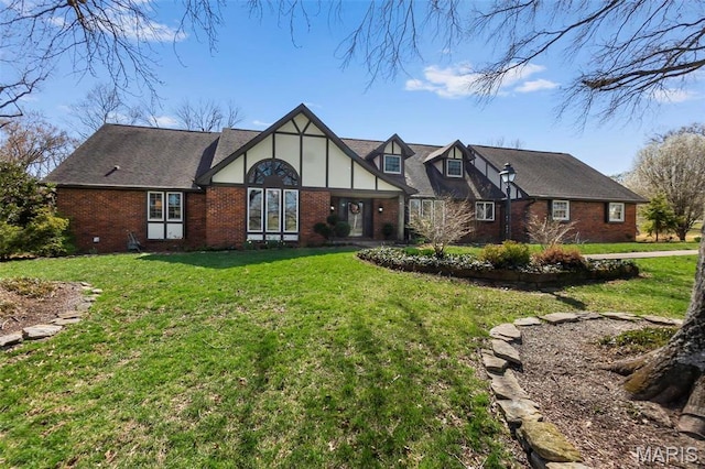 167 Red Fox Ln, Cape Girardeau, MO 63701 - english style home with brick siding and a front yard