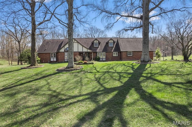 167 Red Fox Ln, Cape Girardeau, MO 63701 - english style home with brick siding and a front lawn