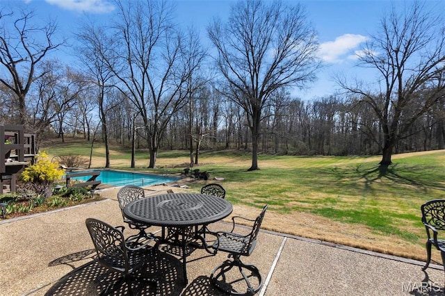 167 Red Fox Ln, Cape Girardeau, MO 63701 - view of patio / terrace featuring an outdoor pool and view of scattered trees