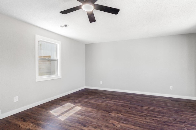 1005 Tyler St, Park Hills, MO 63601 - spare room featuring a ceiling fan, wood finished floors, baseboards, and a textured ceiling