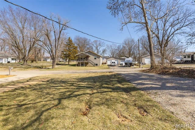 1005 Tyler St, Park Hills, MO 63601 - view of front of home featuring a residential view, a front lawn, and driveway