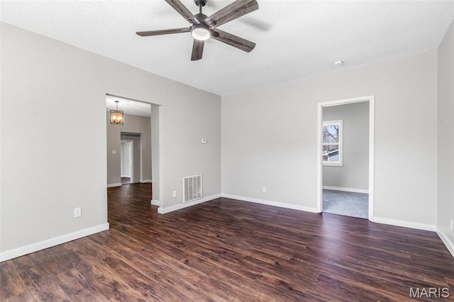 1005 Tyler St, Park Hills, MO 63601 - unfurnished room featuring a ceiling fan, wood finished floors, and baseboards