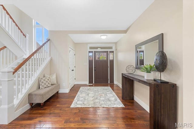 115 Place De Yeager, Lake St Louis, MO 63367 - foyer entrance with dark wood-type flooring, stairway, and baseboards