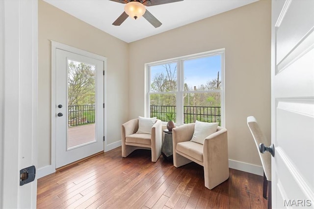 115 Place De Yeager, Lake St Louis, MO 63367 - sitting room featuring plenty of natural light, hardwood / wood-style flooring, ceiling fan, and baseboards