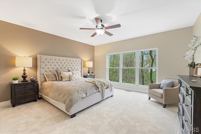 115 Place De Yeager, Lake St Louis, MO 63367 - bedroom featuring light colored carpet, a ceiling fan, and baseboards
