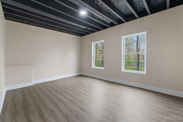 115 Place De Yeager, Lake St Louis, MO 63367 - empty room featuring wood finished floors and baseboards