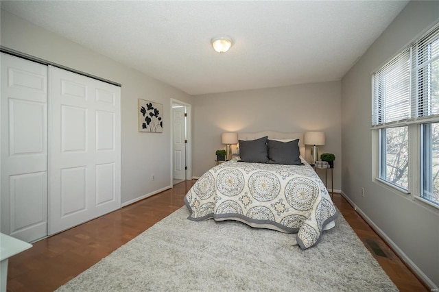 133 Lithia Ave, Saint Louis, MO 63119 - bedroom with multiple windows, wood finished floors, and a closet