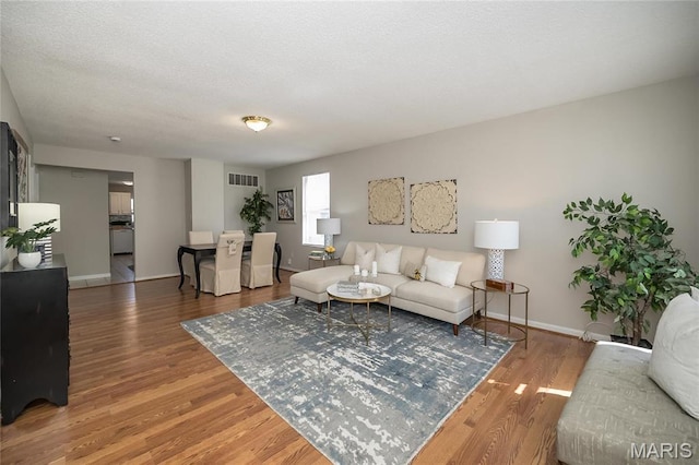 133 Lithia Ave, Saint Louis, MO 63119 - living room featuring wood finished floors and baseboards