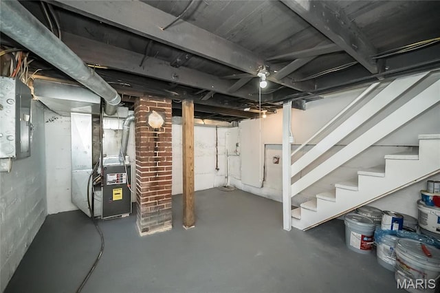 133 Lithia Ave, Saint Louis, MO 63119 - unfinished basement featuring heating unit, electric panel, and stairway