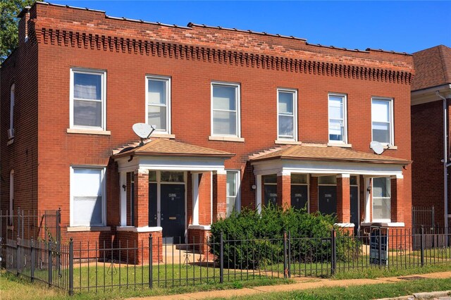 4515 Margaretta Ave, Saint Louis, MO 63115 - view of front of property featuring brick siding and a fenced front yard