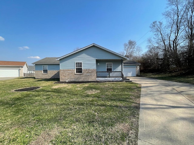 12 Lynnwood Ct, Belleville, IL 62226 - view of front of house with brick siding, a front yard, and a garage