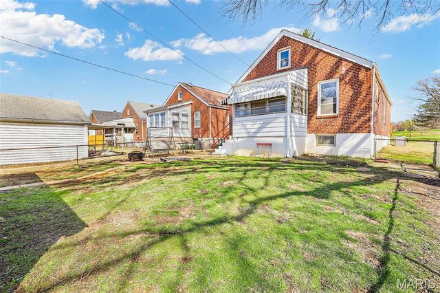 5800 Marquette Ave, Saint Louis, MO 63139 - back of house featuring brick siding