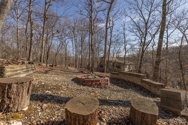 1703 Wynnbrook Woods Dr, Innsbrook, MO 63390 - view of yard featuring a fire pit