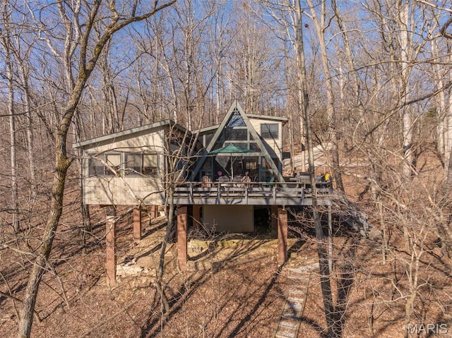 1703 Wynnbrook Woods Dr, Innsbrook, MO 63390 - rear view of property featuring a wooden deck