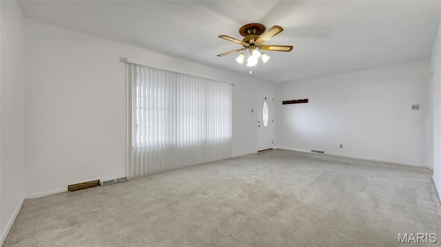 912 Salem Way, Ellisville, MO 63021 - carpeted spare room featuring a ceiling fan and baseboards