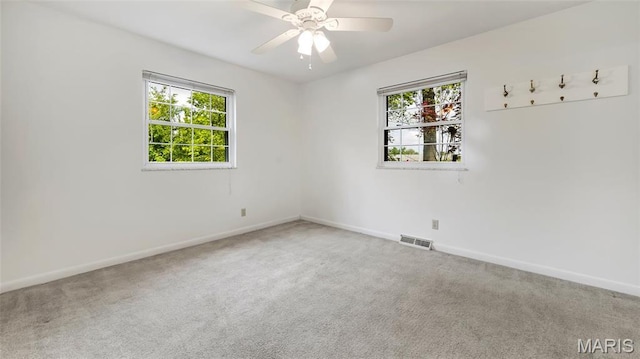 912 Salem Way, Ellisville, MO 63021 - carpeted empty room with plenty of natural light, baseboards, and ceiling fan