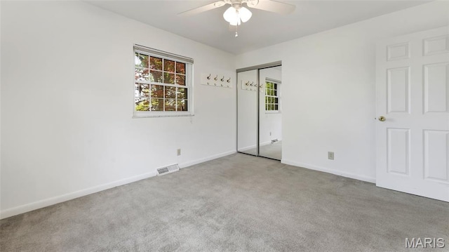 912 Salem Way, Ellisville, MO 63021 - unfurnished bedroom featuring carpet floors, multiple windows, and baseboards