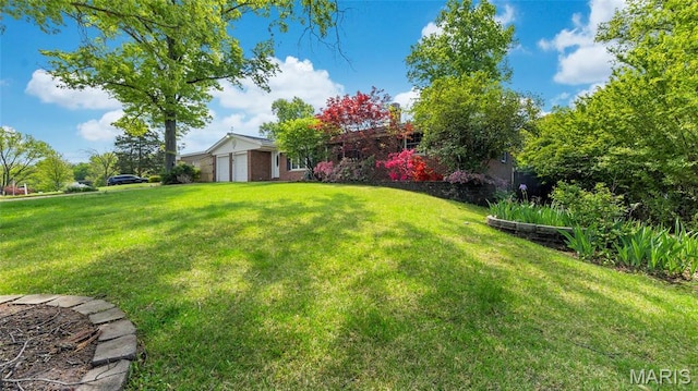 912 Salem Way, Ellisville, MO 63021 - view of green lawn with a garage