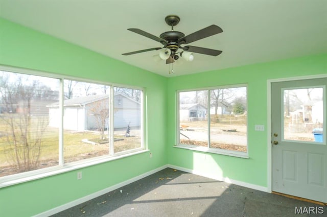2500 Pine St, Granite City, IL 62040 - unfurnished sunroom featuring ceiling fan