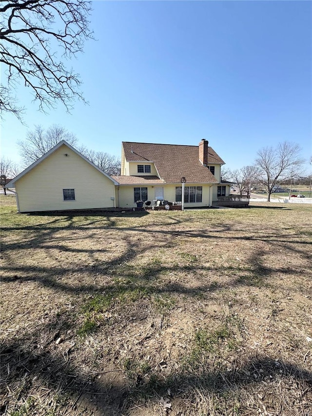 4 N Missouri Ave, Salem, MO 65560 - rear view of property featuring a chimney