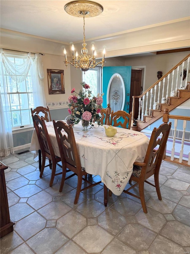 4 N Missouri Ave, Salem, MO 65560 - dining space with a chandelier, plenty of natural light, and stone finish floors