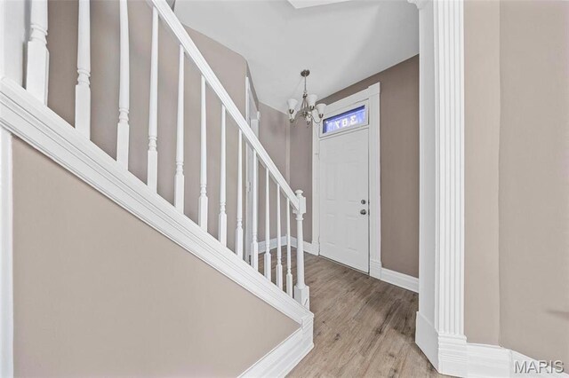 307 S State Highway 47, Warrenton, MO 63383 - entryway featuring a chandelier, wood finished floors, stairs, and baseboards