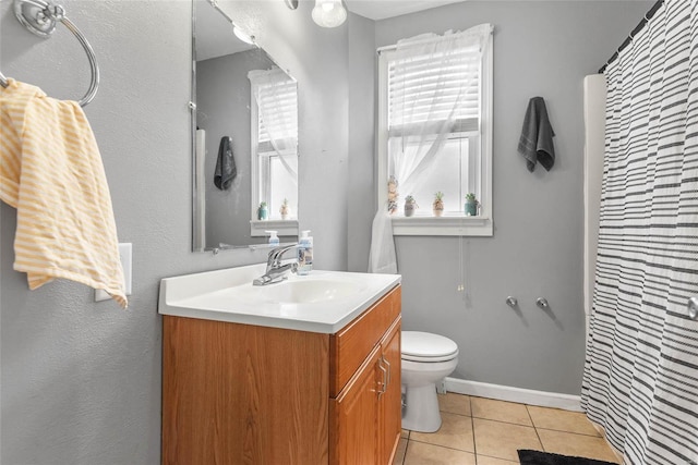 full bathroom featuring tile patterned flooring, toilet, vanity, and a shower with shower curtain