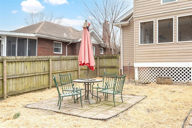 view of patio with fence