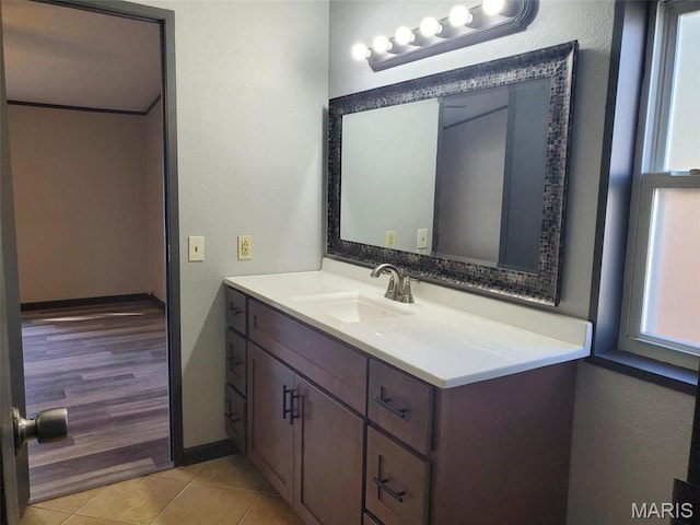 19983 Oak Dr, Carlyle, IL 62231 - bathroom featuring vanity, tile patterned floors, and baseboards