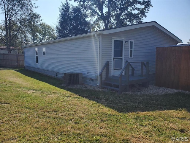 19983 Oak Dr, Carlyle, IL 62231 - back of property featuring crawl space, central AC, and a deck