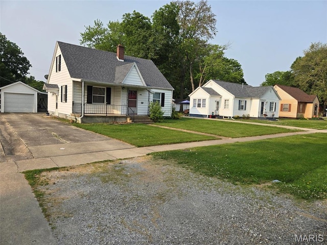1450 Mulliken St, Carlyle, IL 62231 - view of front of home with driveway, covered porch, an outdoor structure, a chimney, and a garage